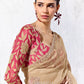 Digitally printed satin silk blouse in red with floral print paired with a premium champagne gold embroidered Mulberry Cotton Silk saree.