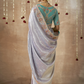 KIMORA’S LAVENDER ZARI TISSUE DOLA SILK SAREE