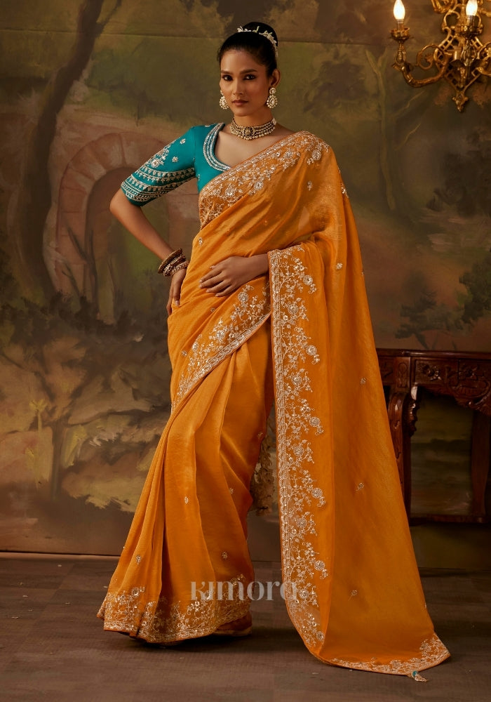 yellow saree with heavy border for haldi occasion
