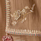 Gold soft silk saree with embroidered elephant pallu, ruby emerald border and elephant tassel