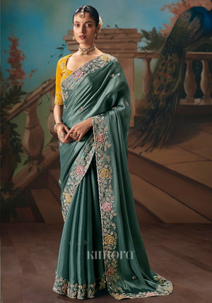 Nandita tissue silk Floral Patch Work Saree In Teal Blue