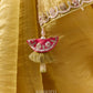 Olive gold soft silk saree with silver sequin border and embellished tassel detail