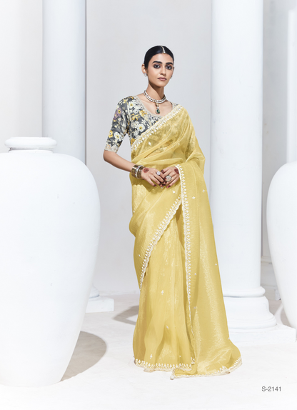 Graceful Yellow Saree with Floral-Print Blouse – Radiant Elegance