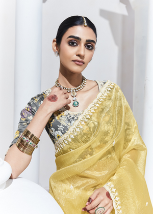 Graceful Yellow Saree with Floral-Print Blouse – Radiant Elegance