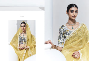 Graceful Yellow Saree with Floral-Print Blouse – Radiant Elegance