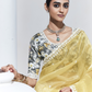 Graceful Yellow Saree with Floral-Print Blouse – Radiant Elegance