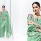 Green Silk Saree with Floral Blouse – A Perfect Blend of Grace & Elegance