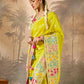Yellow saree paired with a red blouse