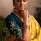 Vibrant Yellow Silk Saree with Teal Embroidered Blouse