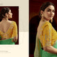 Green Banarasi Silk Saree with Mustard Embroidered Blouse