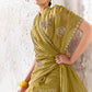 Soft silk olive gold saree featuring delicate silver sequin embroidered border