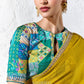 Teal digitally printed satin silk blouse with multicolour patchwork design paired with a premium chartreuse yellow tissue silk saree.