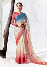 Tri-tone soft shimmer tissue silk saree in cerulean blue ivory and coral with crimson blouse