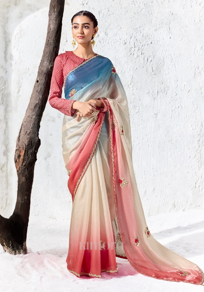 Tri-tone soft shimmer tissue silk saree in cerulean blue ivory and coral with crimson blouse