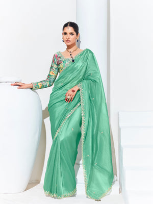 GREEN SILK SAREE WITH FLORAL BLOUSE – A PERFECT BLEND OF GRACE & ELEGANCEGREEN SILK SAREE
