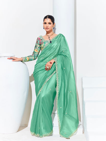 GREEN SILK SAREE WITH FLORAL BLOUSE – A PERFECT BLEND OF GRACE & ELEGANCEGREEN SILK SAREE
