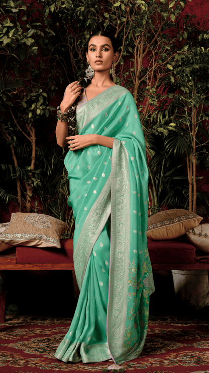 EMBRACE TIMELESS GRACE WITH THE SEA GREEN SERENITY SAREE BY KIMORA - Kimora.in