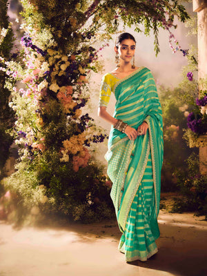 The Tropical Bloom: A Symphony of Green and Gold