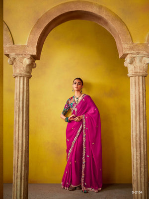 REGAL MAGENTA ELEGANCE: A TIMELESS SAREE OF OPULENCE