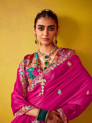 REGAL MAGENTA ELEGANCE: A TIMELESS SAREE OF OPULENCE