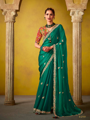 EMERALD GREEN SAREE WITH A VIBRANT FLORAL EMBROIDERED BLOUSE