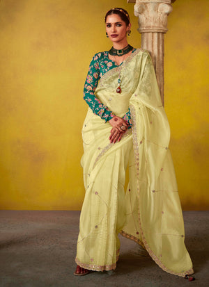 LEMON YELLOW SAREE WITH EMBROIDERED TEAL BLOUSE