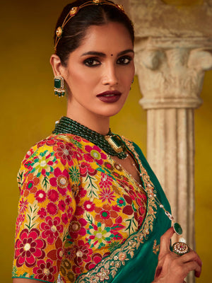 EMERALD GREEN SAREE WITH A VIBRANT FLORAL EMBROIDERED BLOUSE