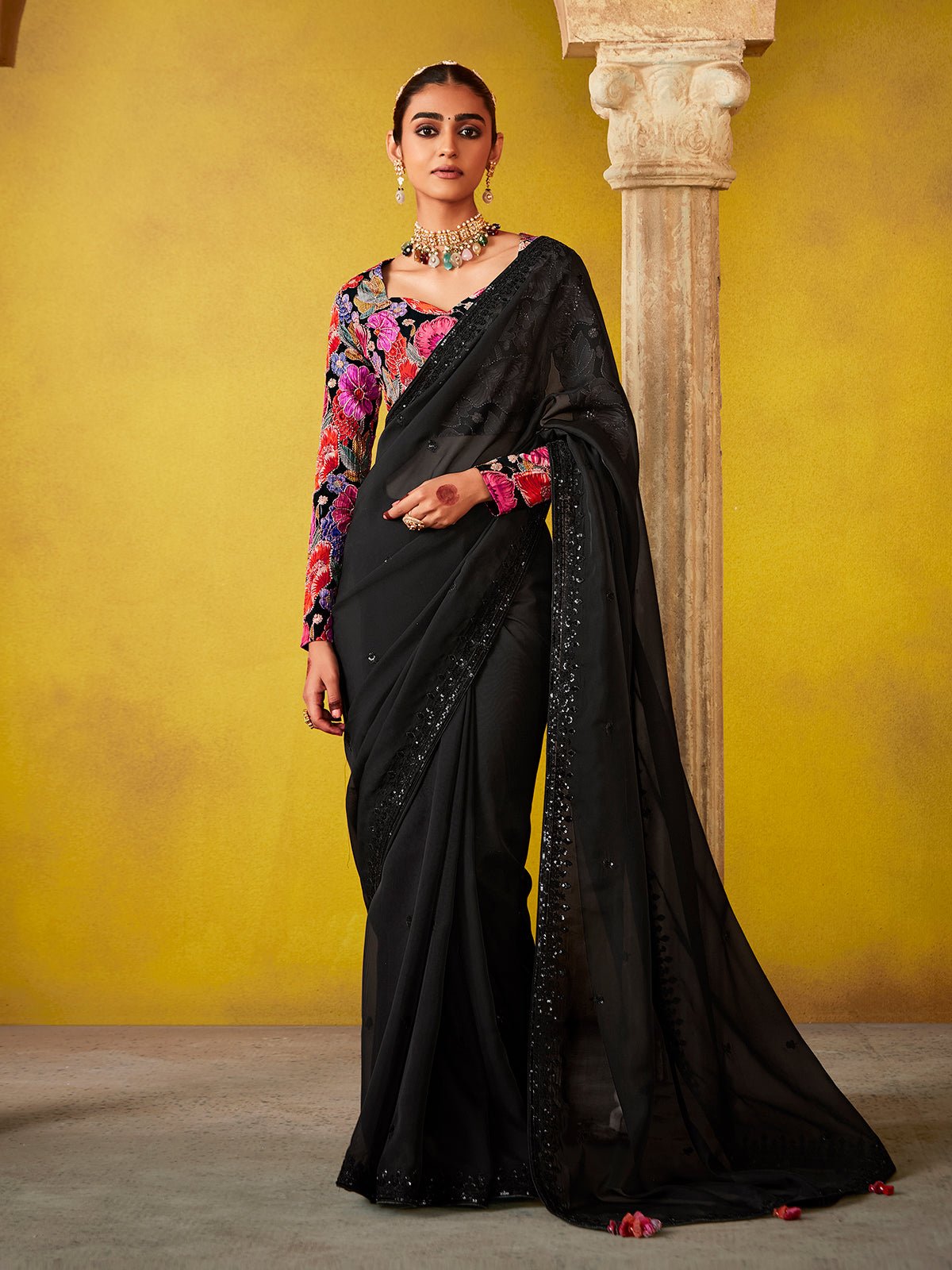 Elegant Black Saree with Vibrant Floral Embroidered Blouse