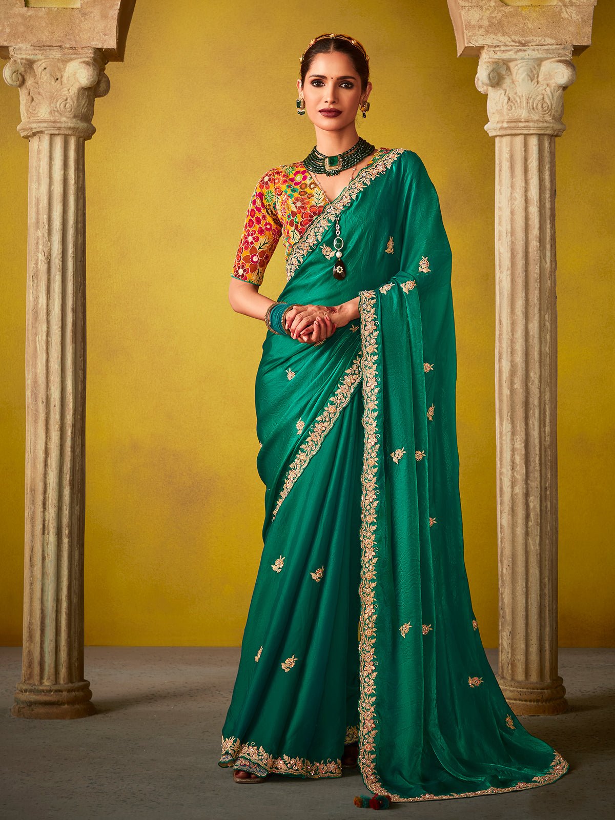 Emerald Green Saree with a Vibrant Floral Embroidered Blouse
