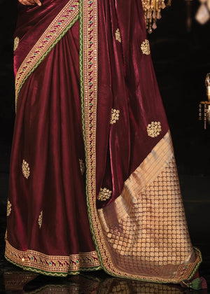 Regal Maroon Kanjivaram Silk Saree with Rich Golden Zari & Green Embroidered Blouse