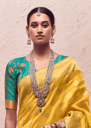 KIMORA’S YELLOW FLORAL BANARASI CREPE DOLA SILK SAREE - Kimora.in