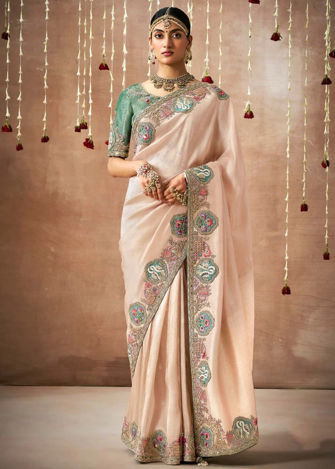 Peach Kanjivaram Silk Saree with Jade Green Blouse