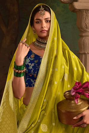 Yellow Banarasi Dola Silk Saree with Contrasting Blue Blouse