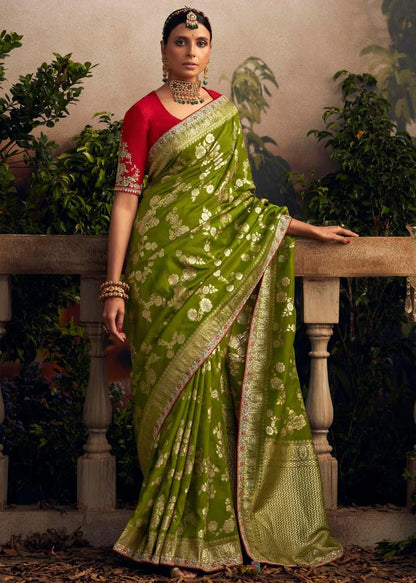 Glamorous Green Zari Woven Dola Silk Wedding Saree with Red Blouse