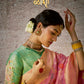 Pastel Pink Banarasi Silk Saree with Zari Weaving & Contrast Green Embroidered Blouse