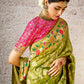 Traditional Green Banarasi Silk Saree with Contrast Red Blouse