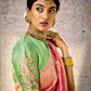 Pastel Pink Banarasi Silk Saree with Zari Weaving & Contrast Green Embroidered Blouse