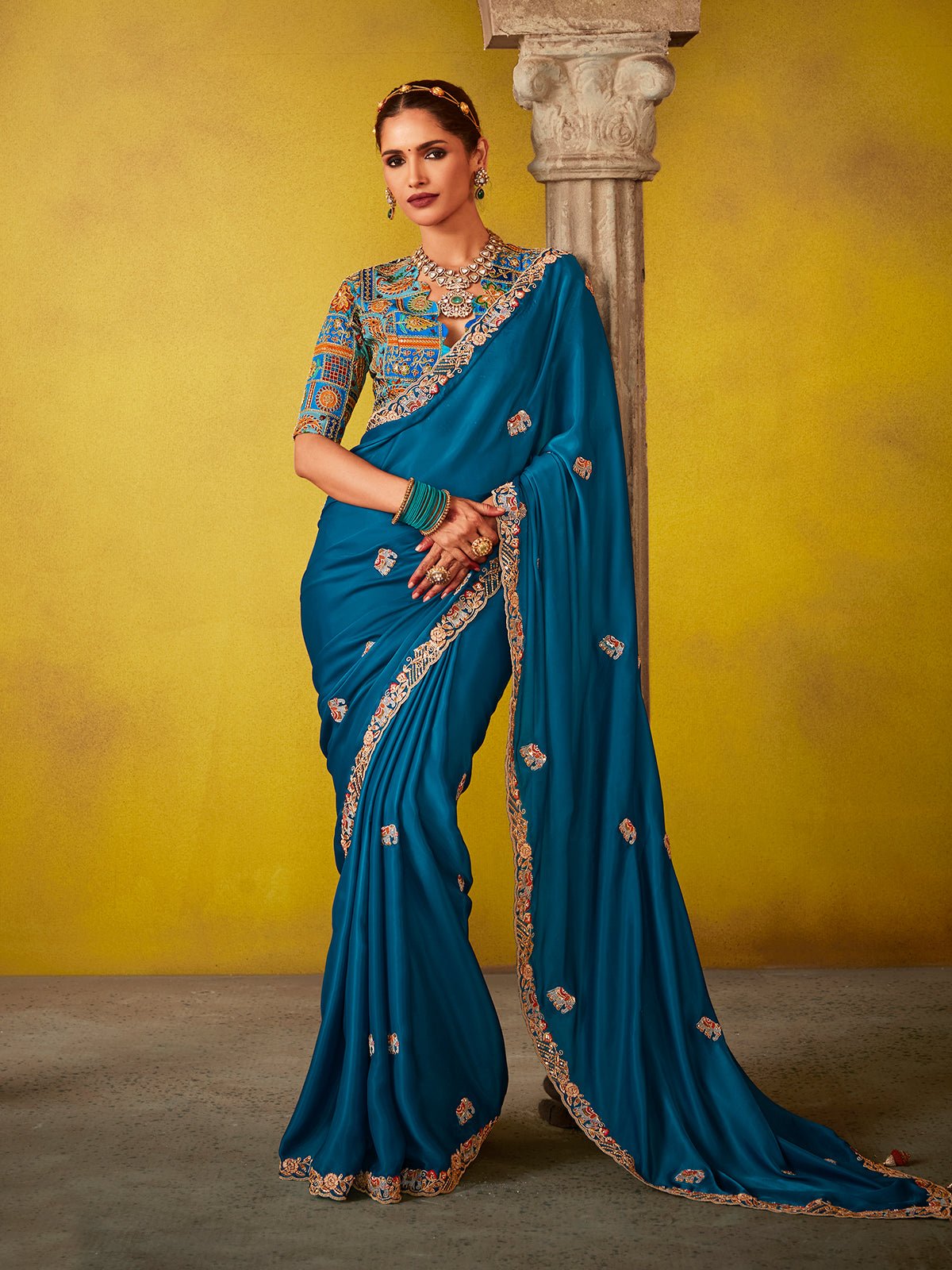 Regal Blue Saree with Intricately Embroidered Blouse