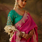 embroidered blouse and intricate silver zari border 