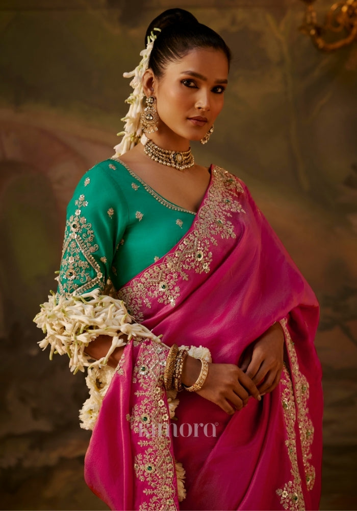 embroidered blouse and intricate silver zari border 