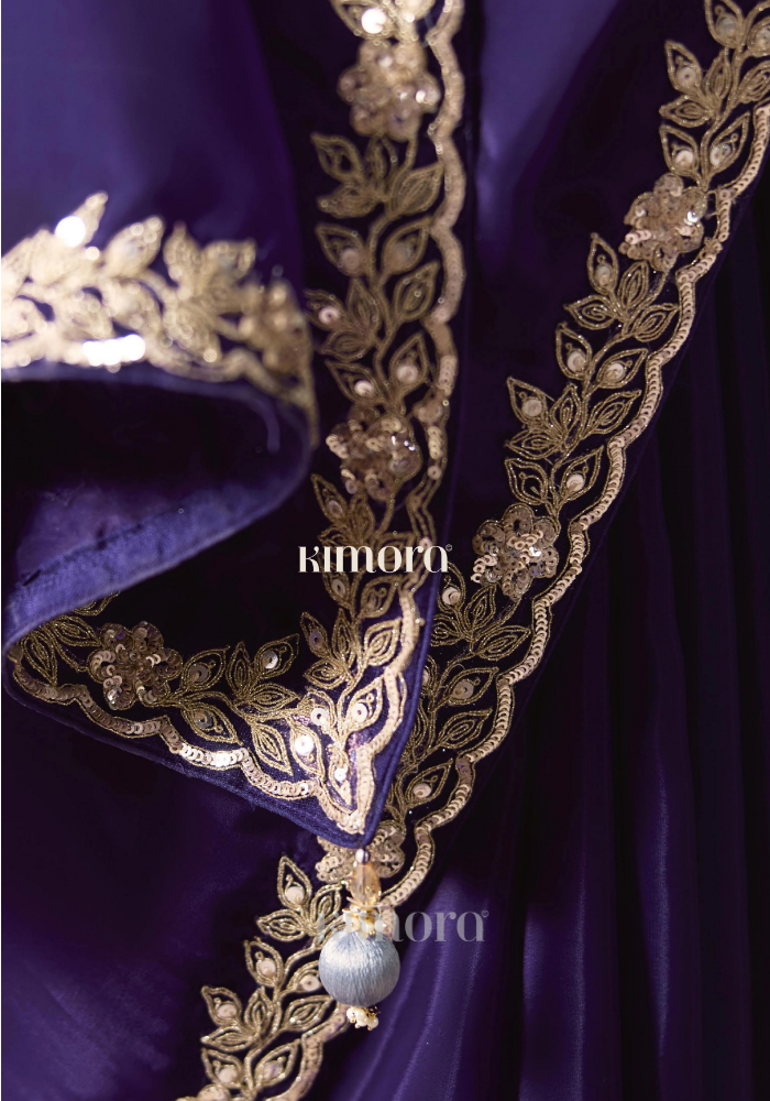 Royal Purple Soft Silk Saree Close-Up with Gold Floral Lace Embroidery, Zari Sequin Detailing and Elegant Festive Border Work