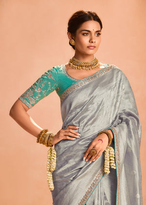 Elegant Silver Kanjivaram Silk Saree with Sea Green Embroidered Blouse – A Timeless Masterpiece