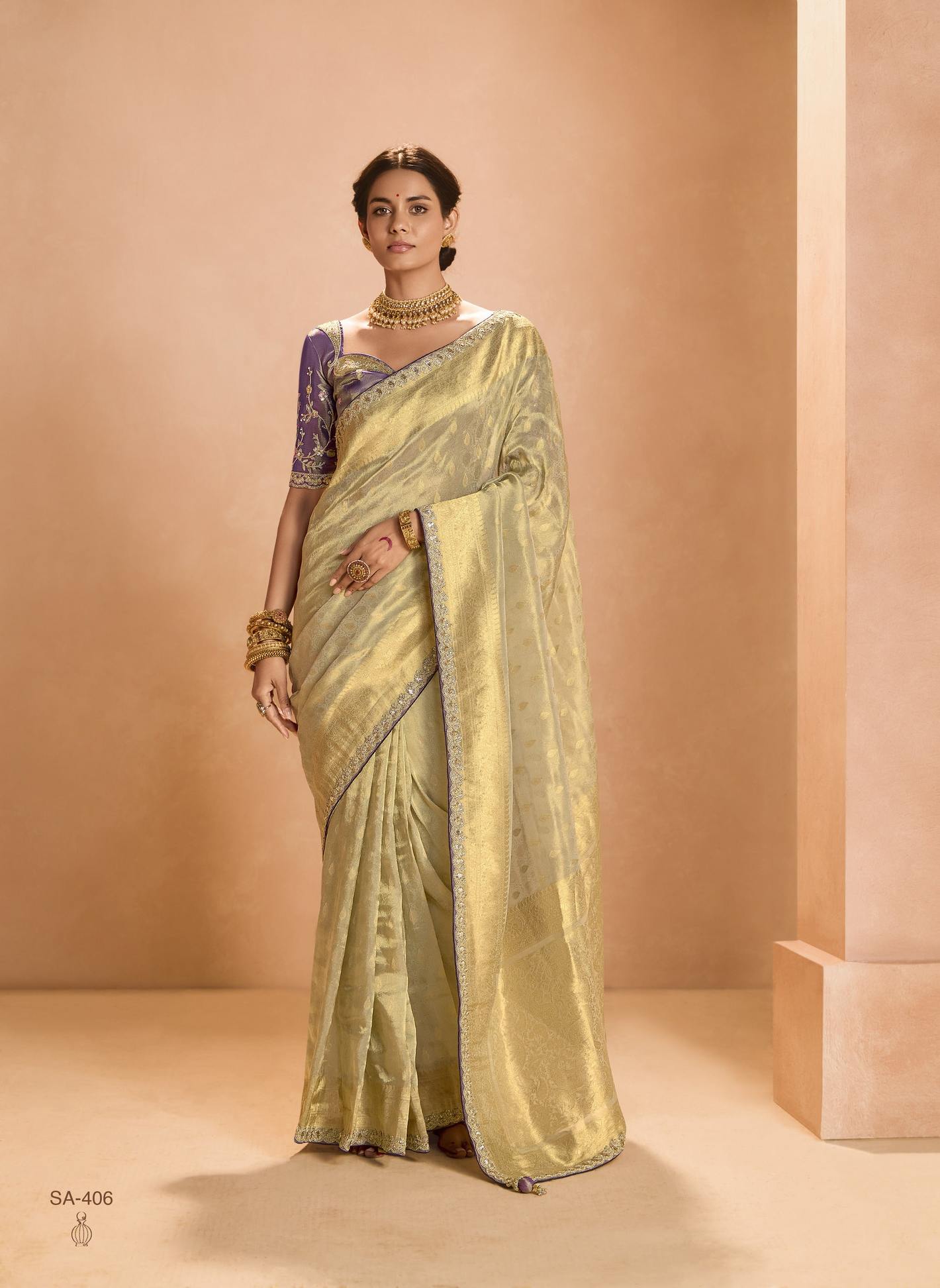 Gold Kanjivaram Silk Saree with Royal Purple Embroidered Blouse – Timeless Grace