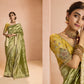 Radiant Green Kanjivaram Silk Saree with Ornate Yellow Blouse – A Regal Ensemble