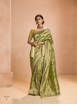 Radiant Green Kanjivaram Silk Saree with Ornate Yellow Blouse – A Regal Ensemble