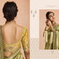 Radiant Green Kanjivaram Silk Saree with Ornate Yellow Blouse – A Regal Ensemble