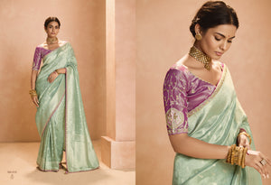 Mint Green Kanjivaram Silk Saree with Elegant Purple Embroidered Blouse – A Dreamy Delight