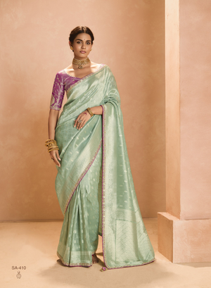 Mint Green Kanjivaram Silk Saree with Elegant Purple Embroidered Blouse – A Dreamy Delight