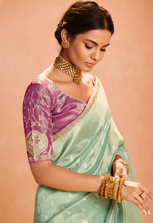 Mint Green Kanjivaram Silk Saree with Elegant Purple Embroidered Blouse – A Dreamy Delight