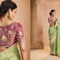 Mint Green Kanjivaram Silk Saree with Wine Embroidered Blouse – Perfect for Weddings & Festive Wear